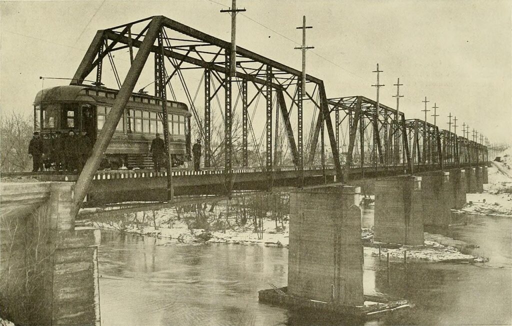 Bridge Over The St- Joseph River At Berrien Springs Eight 15O-Ft. Through Trusses On Concrete Piers.