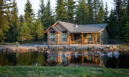 A Picturesque Lakeside Second Home In Michigan During Sunset.
