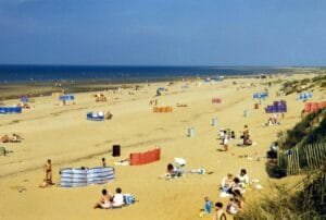 Classic Photo Of People On Beach During Summer