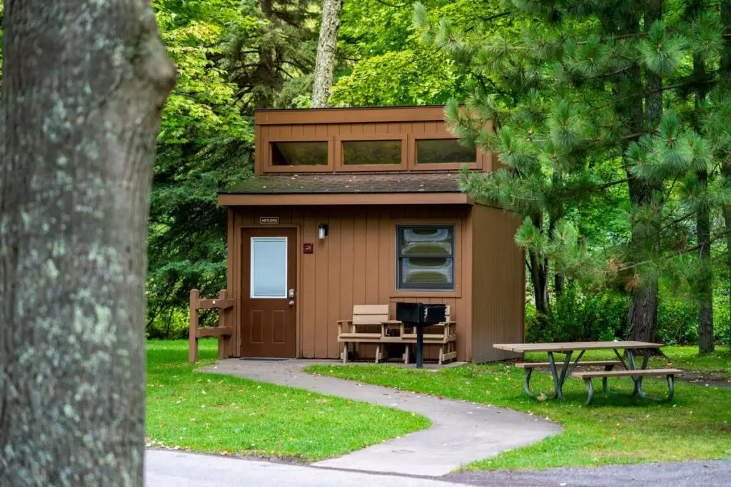 A Small Building In A Park