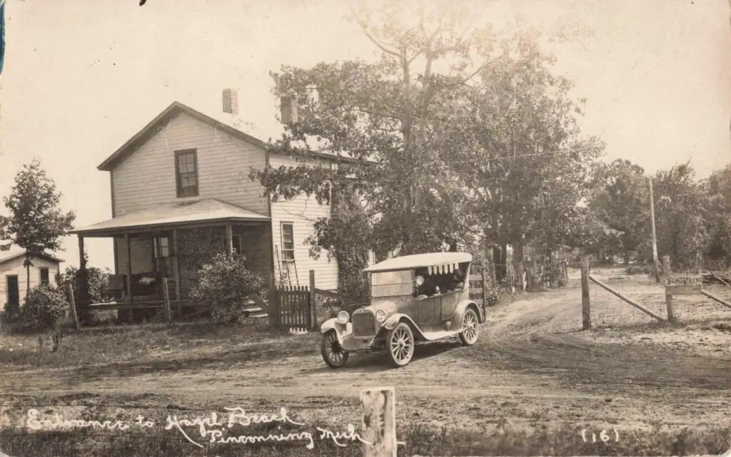 A Model T Ford Turns Toward Hazel Beach, A Quiet Summer Escape On The Saginaw Bay Shoreline Frequented By Vacationers And Locals.