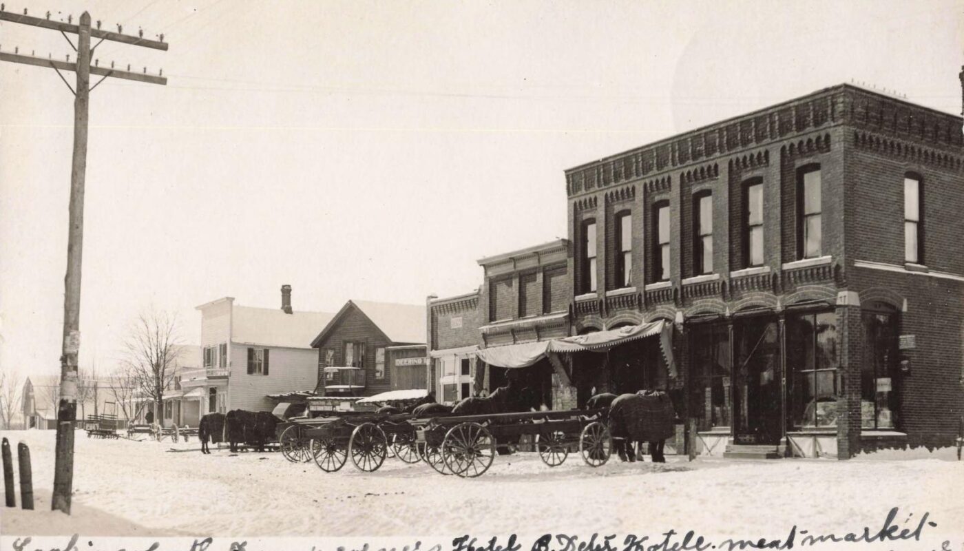 Historic Snowy Street With Horse-Drawn Carriages