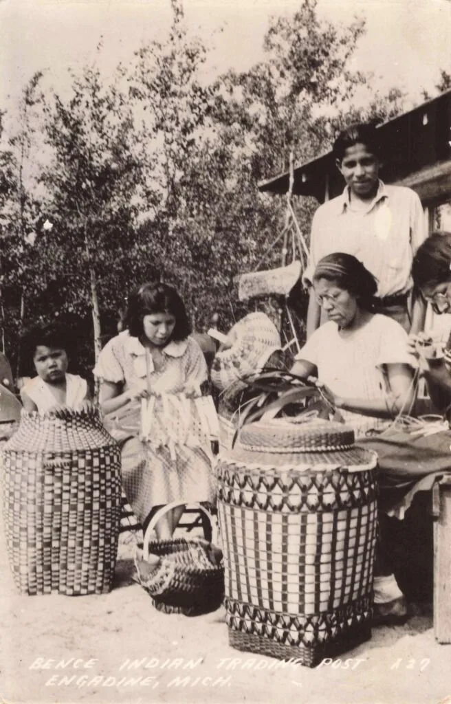 A Group Of People Sitting Outside