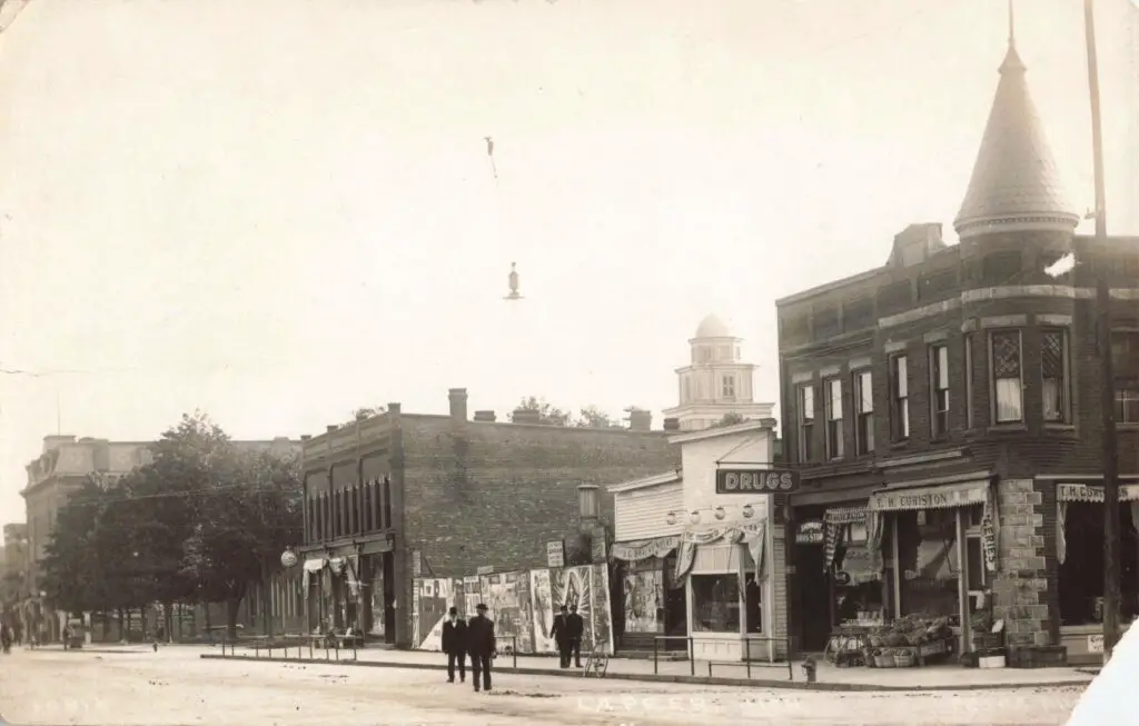 Lapeer Michigan History - A Street With Shops And Buildings