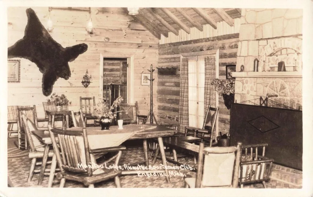 A Room With A Fireplace And A Table