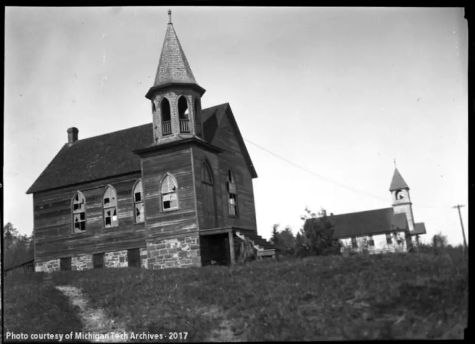 A Building With A Steeple And A Church