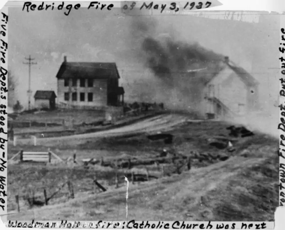 A House On Fire In A Field