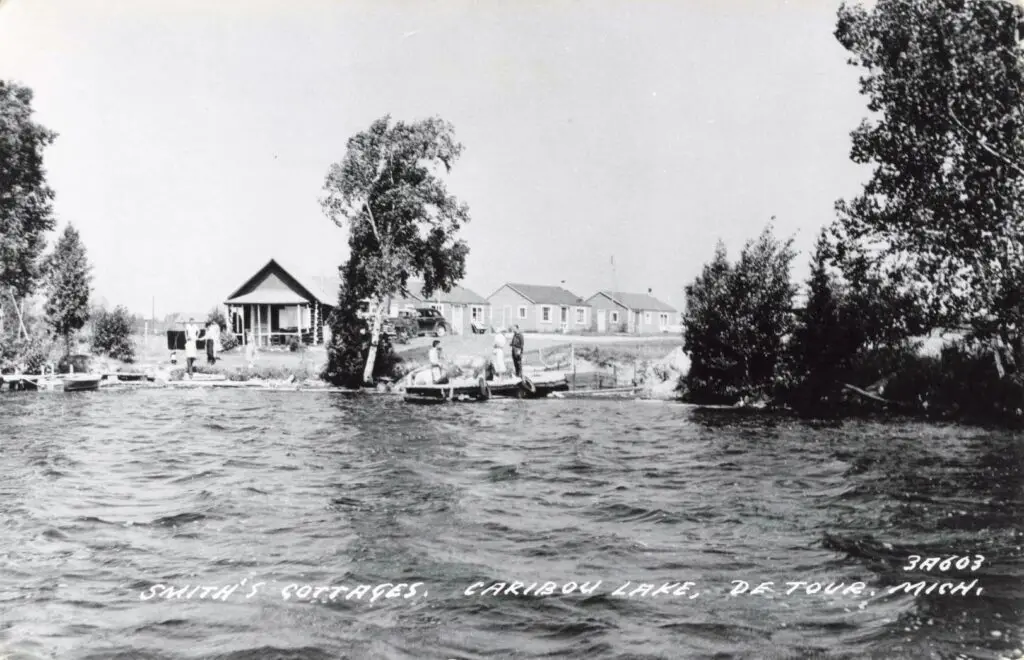 A Group Of People On A Boat On A Lake