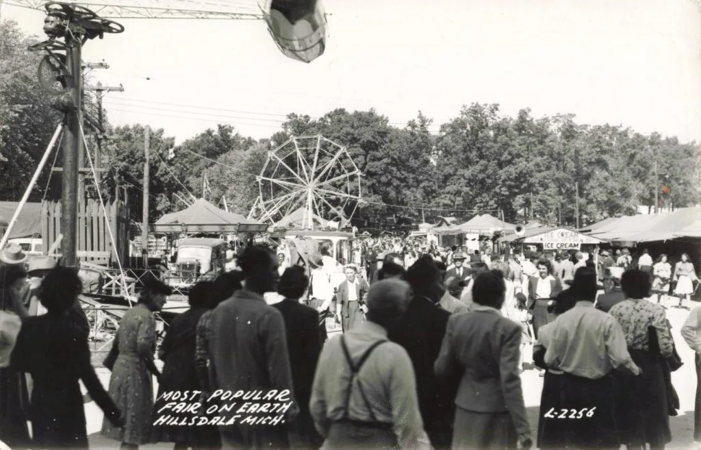 A Group Of People At A Fair