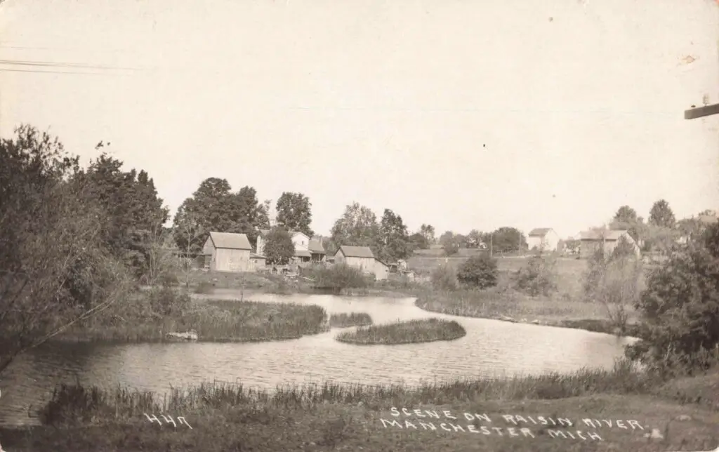 A River With Houses And Trees