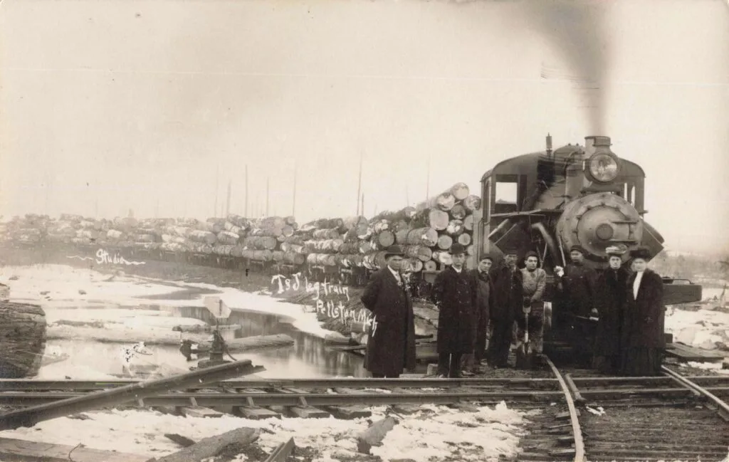 Historic Log Train With Workers - History Of Pellston