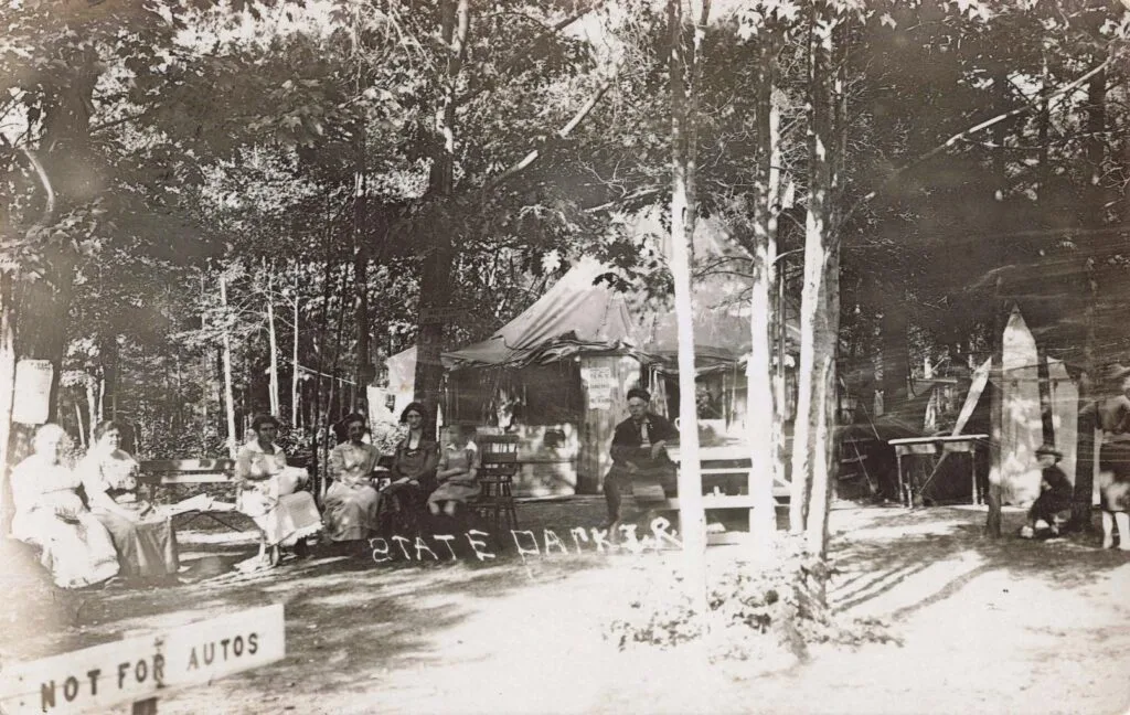 Vintage Camping Scene With People.