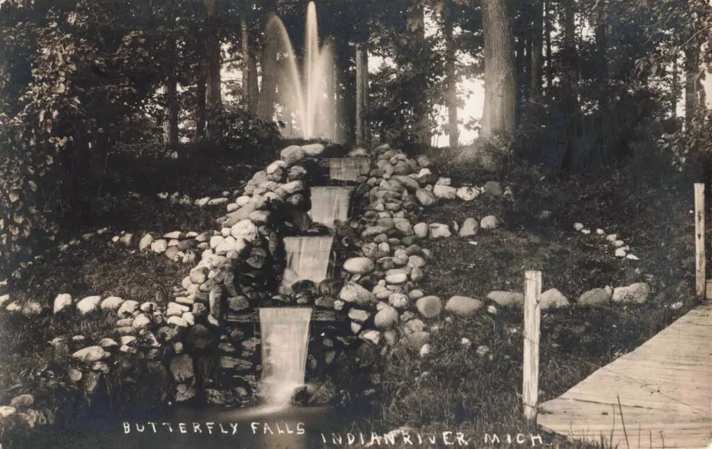 Vintage Waterfall In Wooded Area.