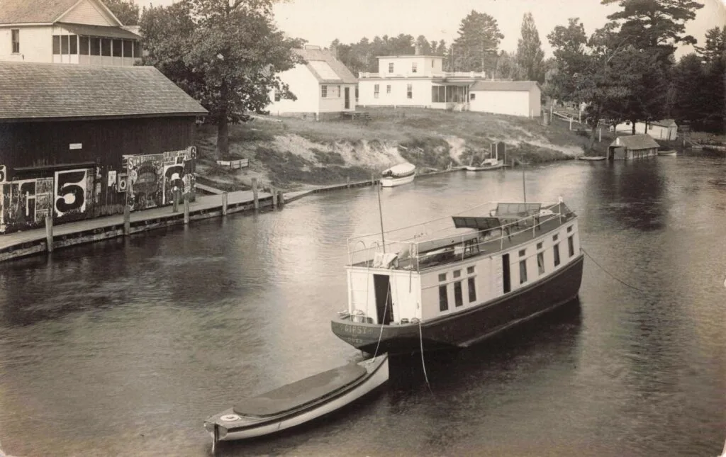 Vintage Boat On Calm River Scene. - Michigan Inland Waterway
