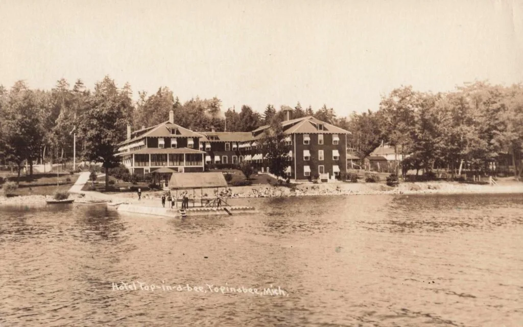 Historic Lakeside Hotel With Boats.