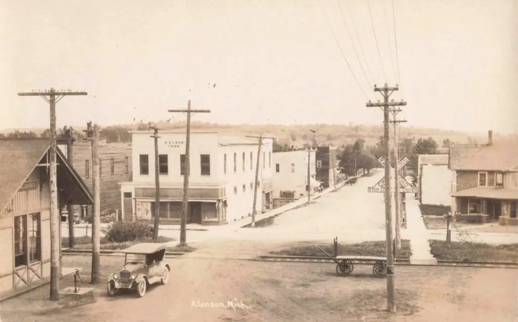 Historic Small Town With Vintage Cars.