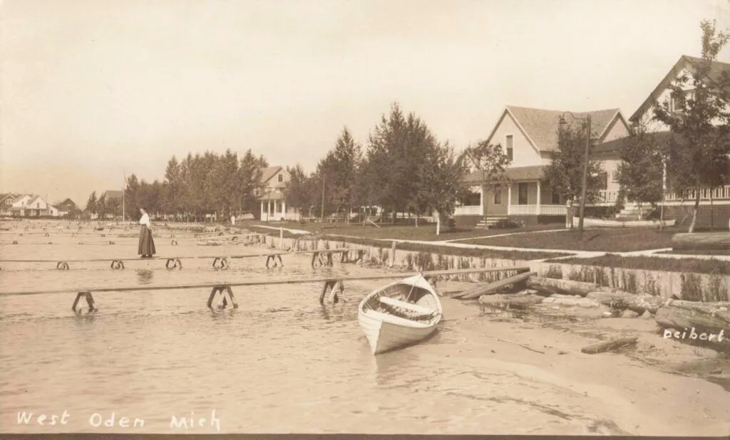 Historic Lakeside Scene With Houses.