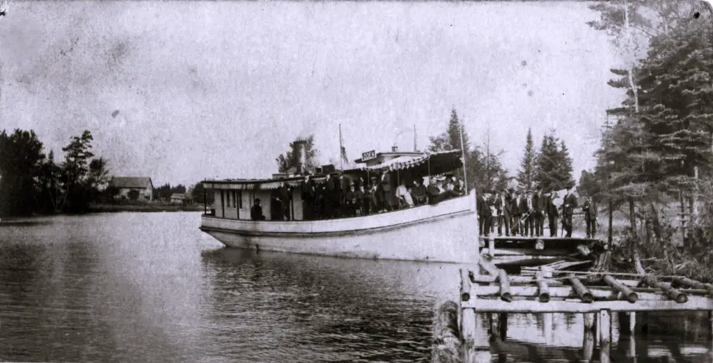 Historic Boat Docked Near Shore.