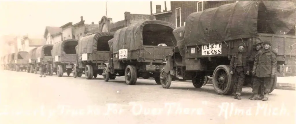 Line Of Vintage Trucks With Soldiers.