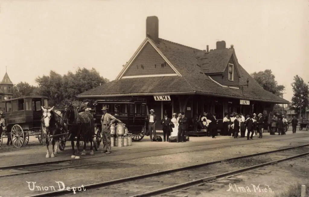 Historic Train Station With Horse-Drawn Carriages