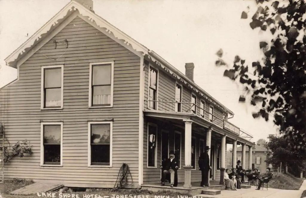Historic Hotel With People Outside.