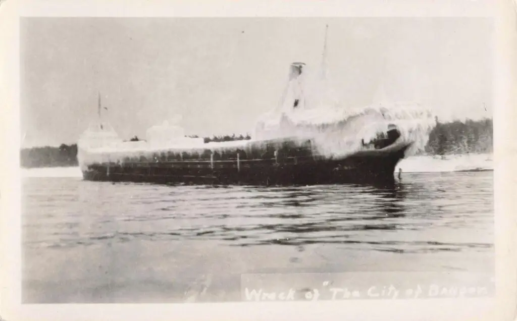 Frozen Shipwreck In Icy Waters.