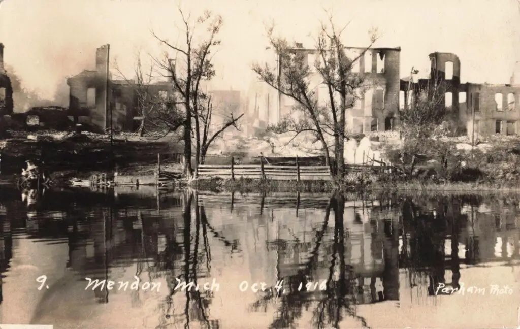 Ruins Reflected In Still Water.