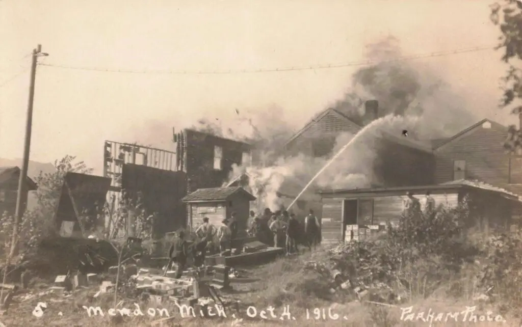 Firefighters Battling A House Fire.