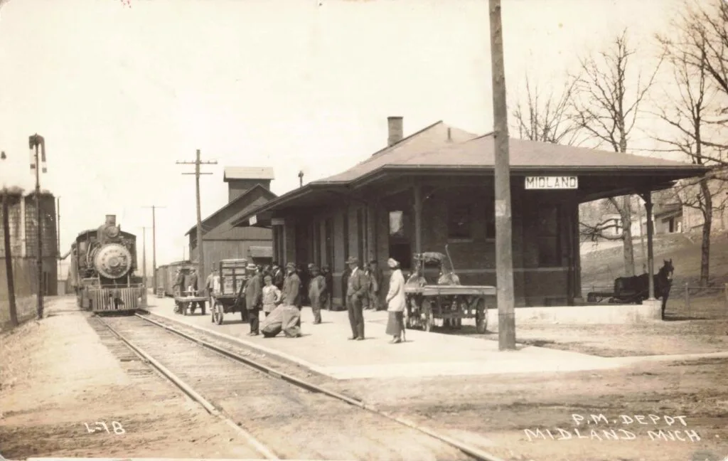 Historic Train Station With Passengers