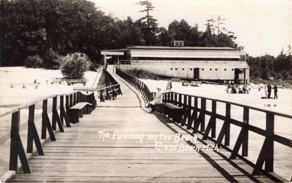 Wooden Boardwalk Leading To Beach Pavilion