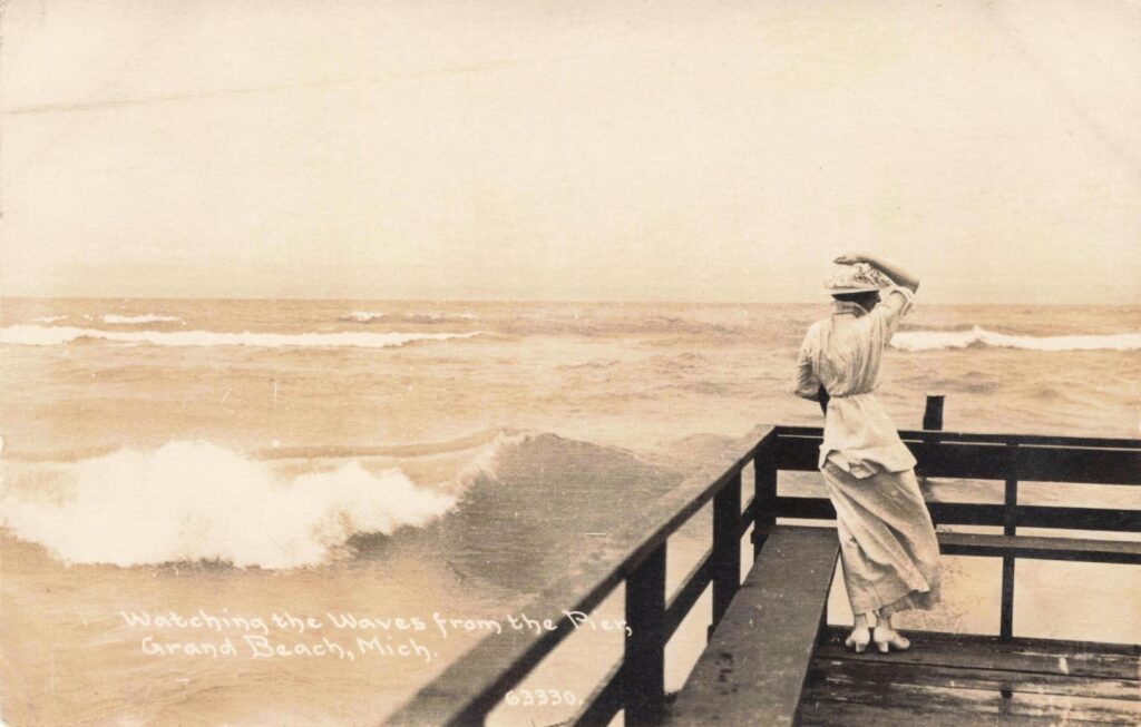 Woman Gazing At Ocean Waves