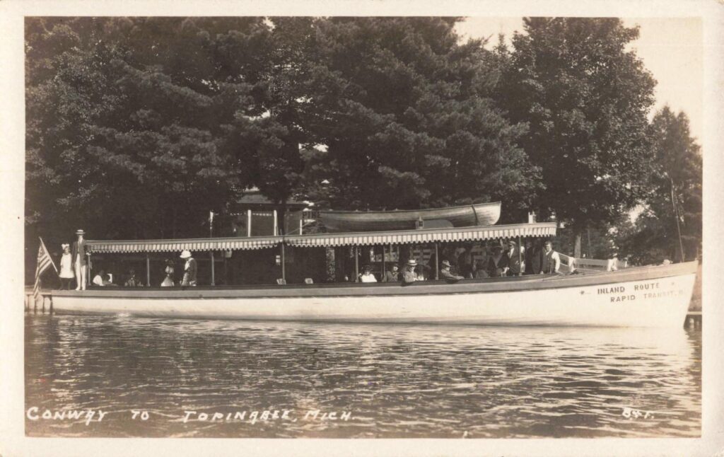 History Of Conway Michigan - Boat On Calm Waters