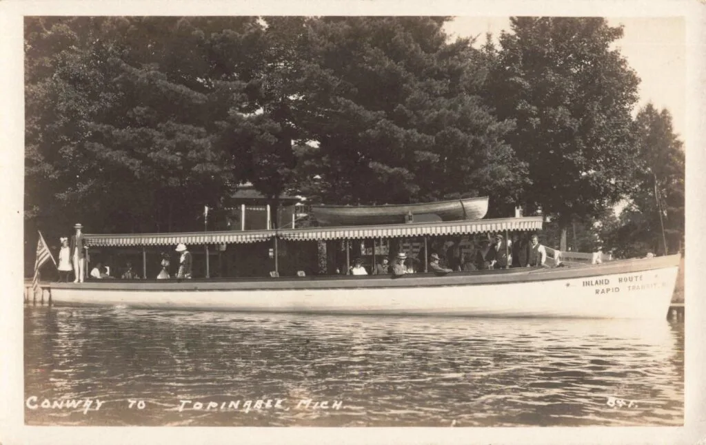 History Of Conway Michigan - Boat On Calm Waters