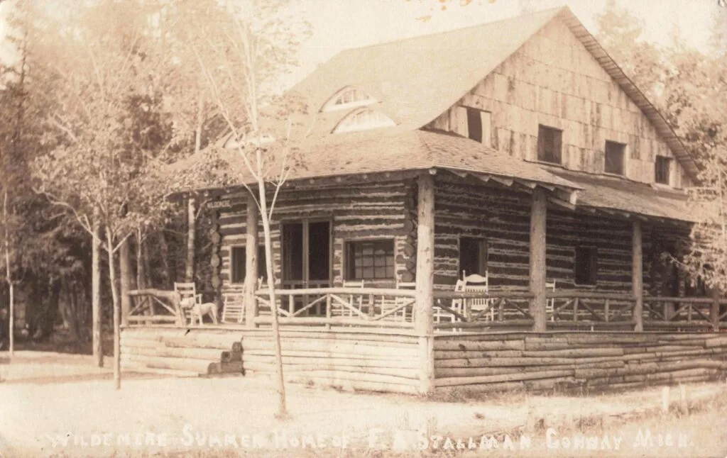 Log Cabin In Wooded Area.