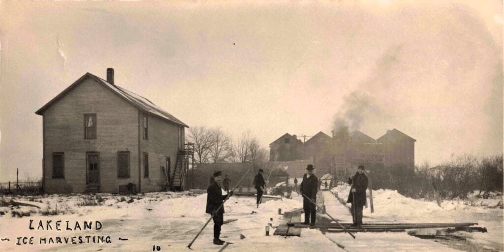 Men Harvesting Ice In Winter