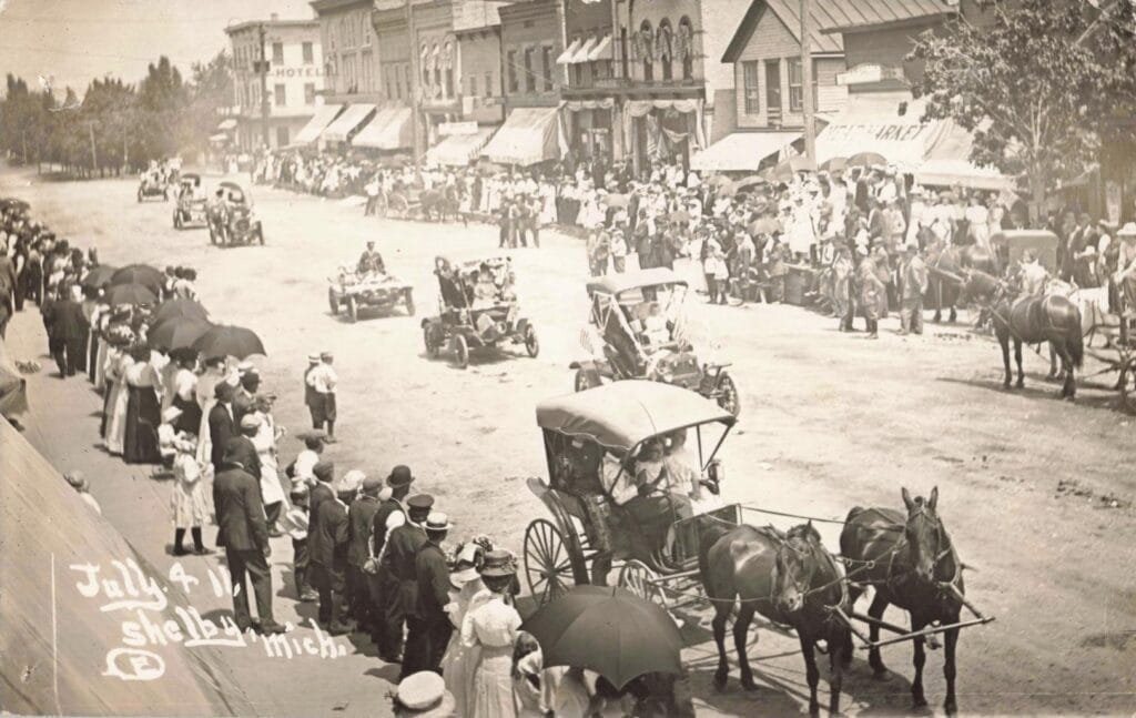 Downtown Shelby Street Scenes – Horse-Drawn Wagons Alongside Early Autos Place Photos Between 1905–1925.
