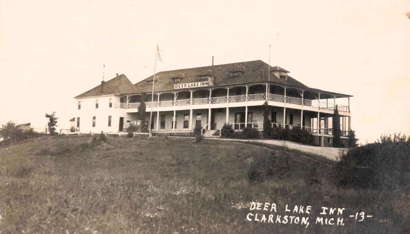 Historic Inn On A Grassy Hill.