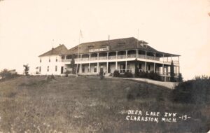 Historic Inn On A Grassy Hill.