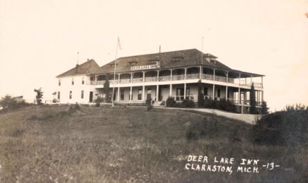 Historic Inn On A Grassy Hill.