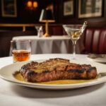 Steak With Drinks In Elegant Setting.