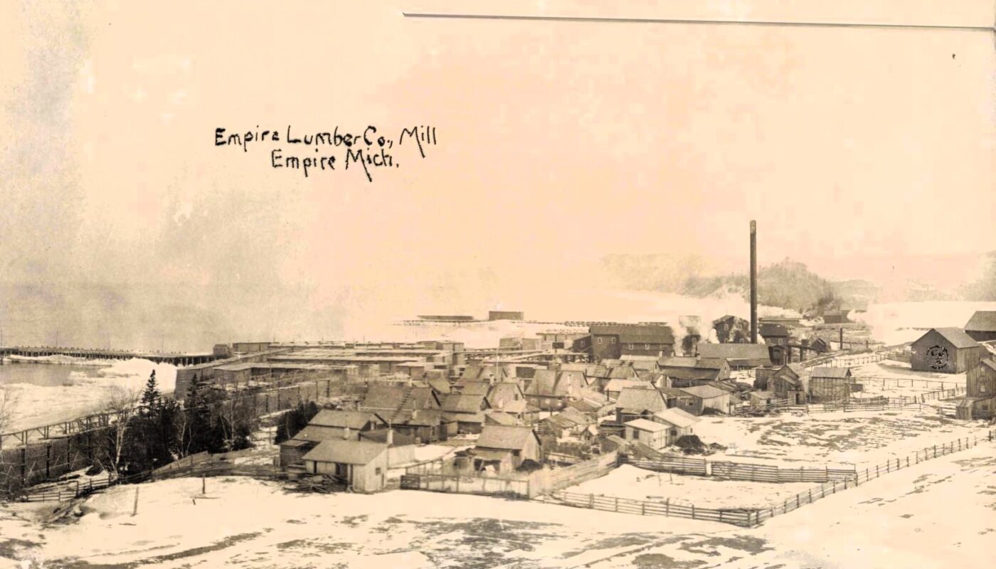 Historic Lumber Mill In Snowy Landscape.