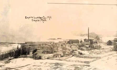 Historic Lumber Mill In Snowy Landscape.