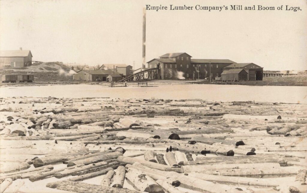 Empire Lumber Companys Mill And Boom Of Logs
