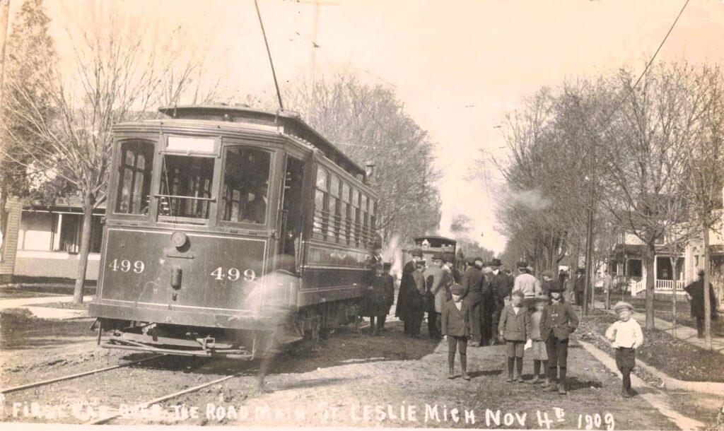 Early Electric Streetcar In Leslie Michigan Surrounded By Residents During Its First Run In 1909. History Of Leslie Michigan