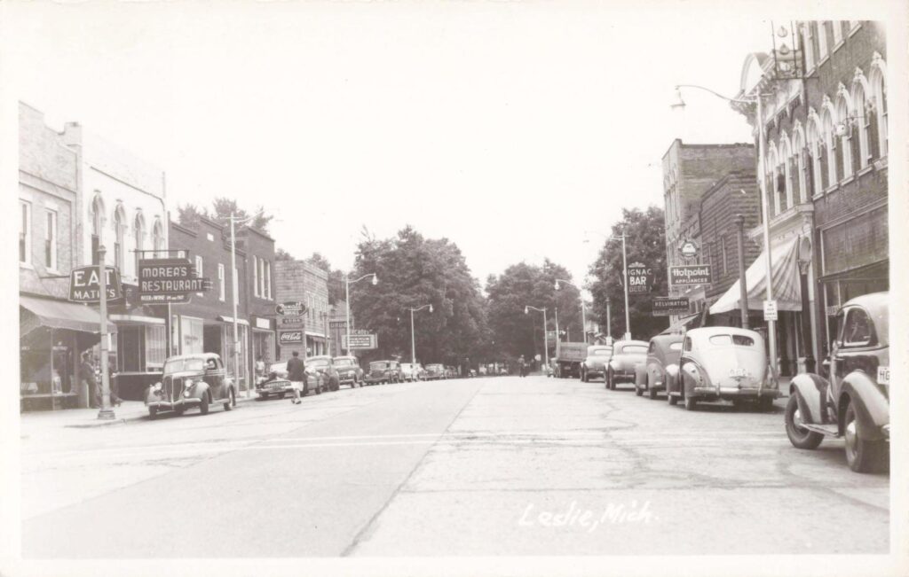 Historic Street Scene With Vintage Cars.