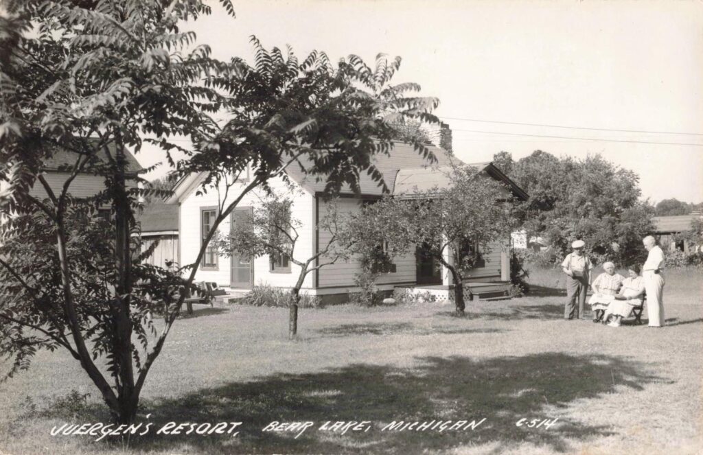 Juergen’s Resort, Bear Lake, Michigan, C.1940S. Families Gathered Outdoors, Reflecting The Slower Pace Of Summer Life.