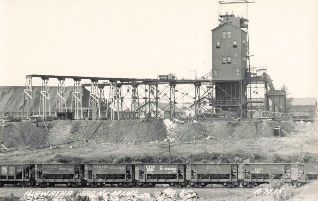 Historic Iron Mine With Train Cars