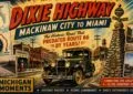 A 1920S-Style Automobile Travels Past The Mackinaw City Dixie Highway Monument, Roadside Businesses And A Map Showing The Route From Michigan To Miami.