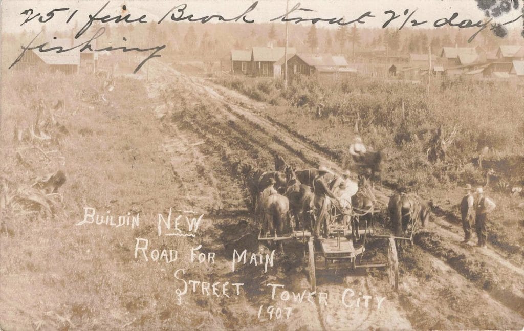 Horse-Drawn Plow On Dirt Road