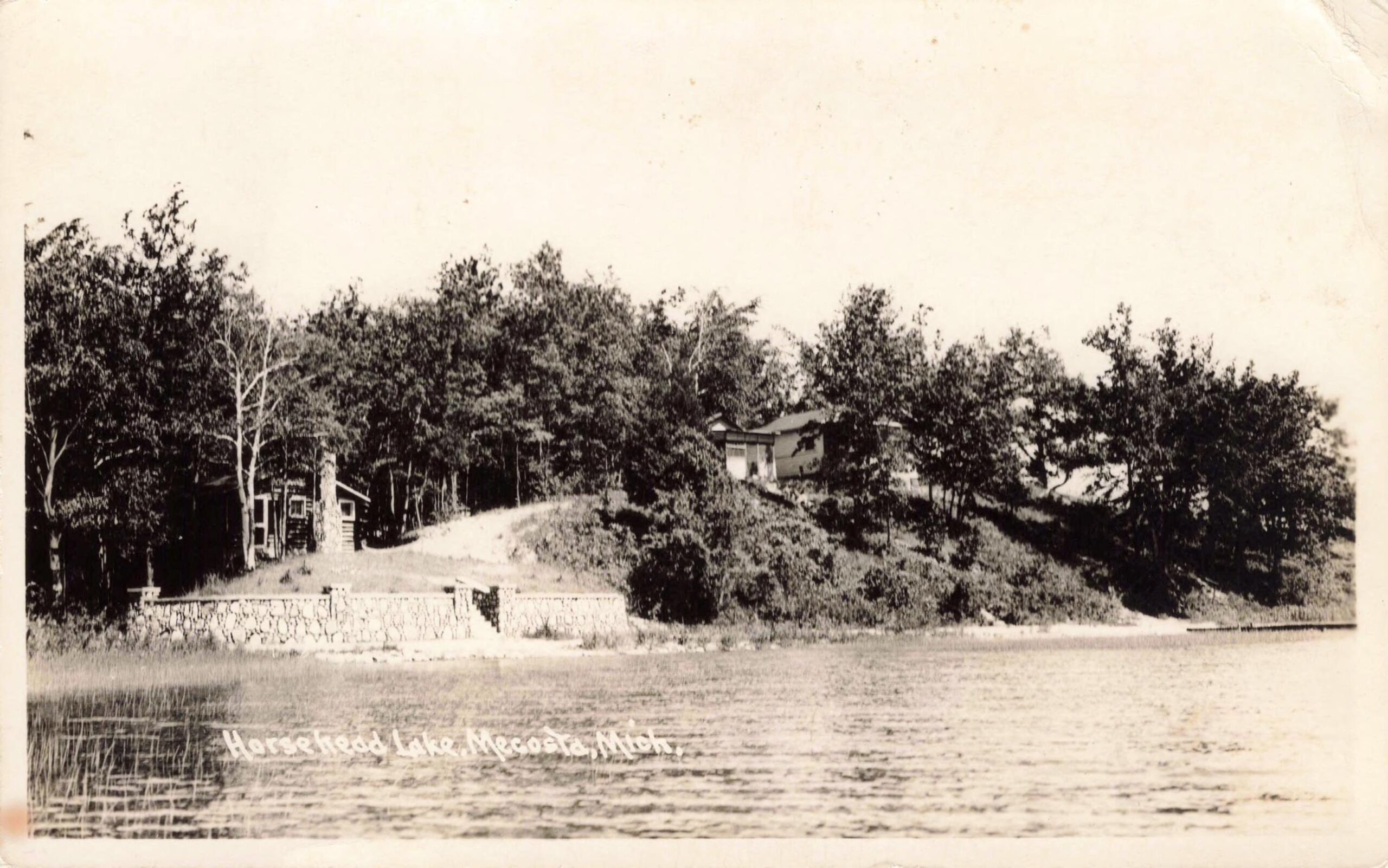 Early Cottages And A Stone Shoreline Wall Along Horsehead Lake In Mecosta County, Michigan